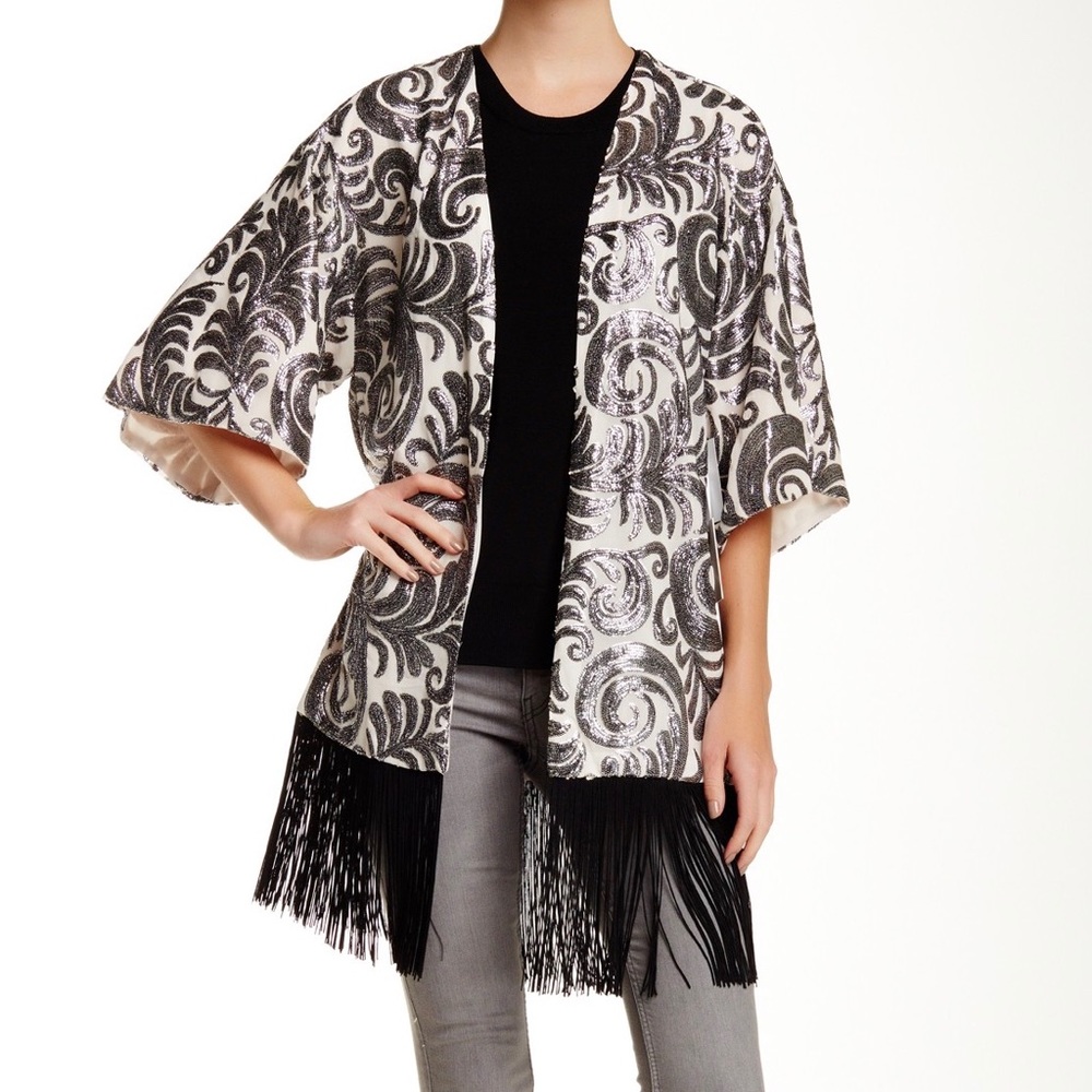 NWT sequin cardigan. New. Women’s size small